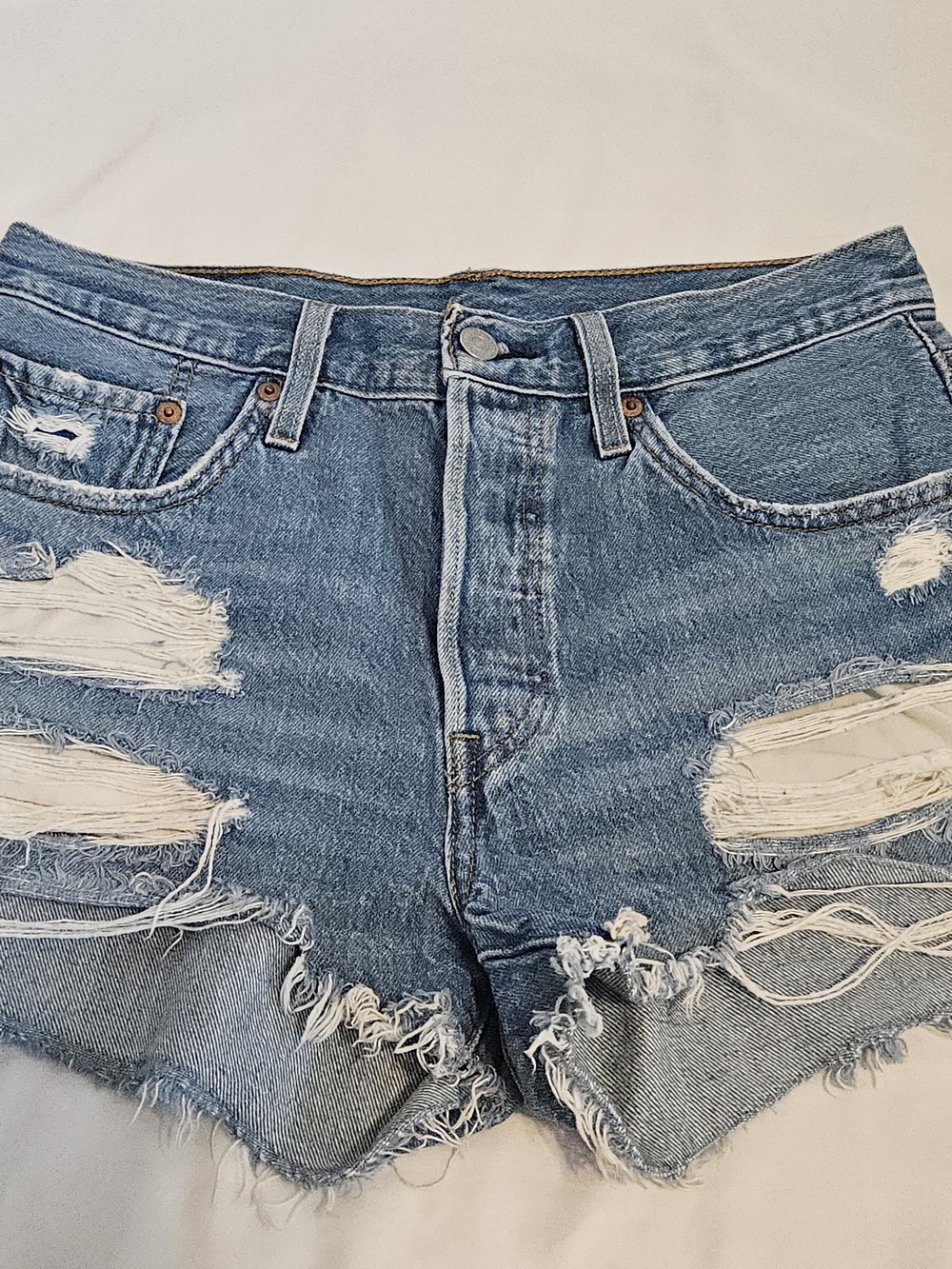 LEVI'S-Distressed, Button-Fly, High-Rise, Denim Shorts in Light Blue Wash SZ 28